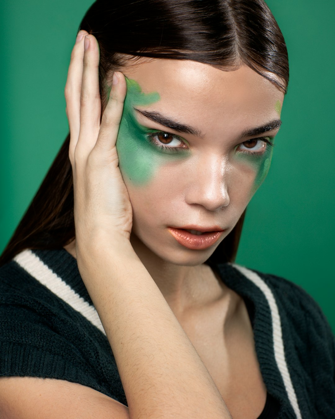 Bold editorial makeup with graphic liner